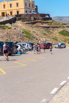 Parc Natural Cap de Creus, Spain :  8 july 2020 : People in Cap de Creus, natural park. Eastern point of Spain, Girona province, Catalonia. Famous tourist destination in Costa Brava. Sunny summer day with blue sky and clouds