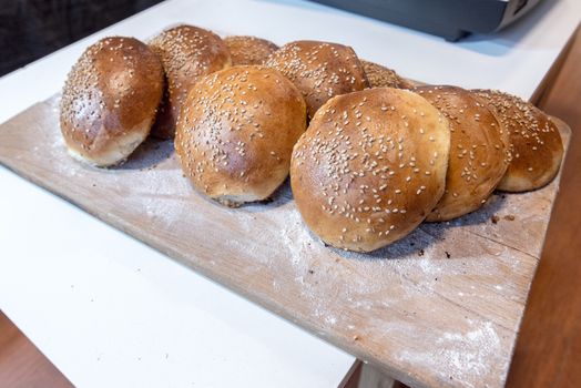 Homemade bread on table with light white flour.