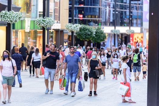 Andorra La Vella, Andorra : 2020 July 06 : People Walk in the Comercial Street named Meritxell after COVID19. Andorra la Vella, Andorra