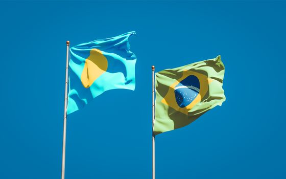 Beautiful national state flags of Palau and Brasil together at the sky background. 3D artwork concept. 