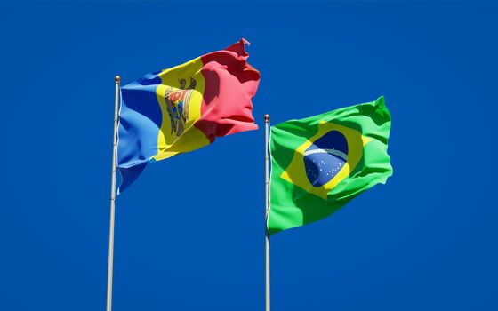 Beautiful national state flags of Moldova and Brasil together at the sky background. 3D artwork concept. 