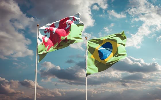 Beautiful national state flags of Wales and Brasil together at the sky background. 3D artwork concept. 