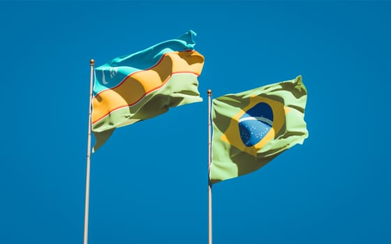 Beautiful national state flags of Karakalpakstan and Brasil together at the sky background. 3D artwork concept. 