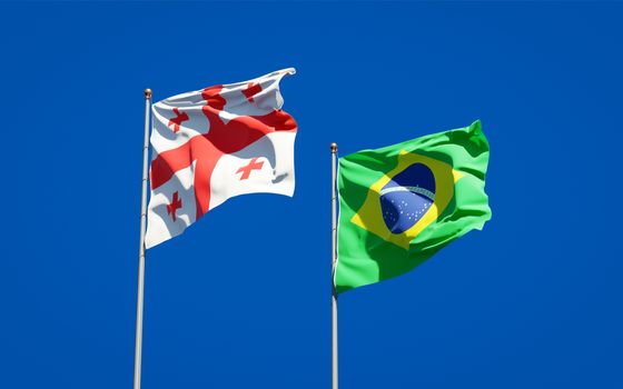 Beautiful national state flags of Georgia and Brasil together at the sky background. 3D artwork concept. 