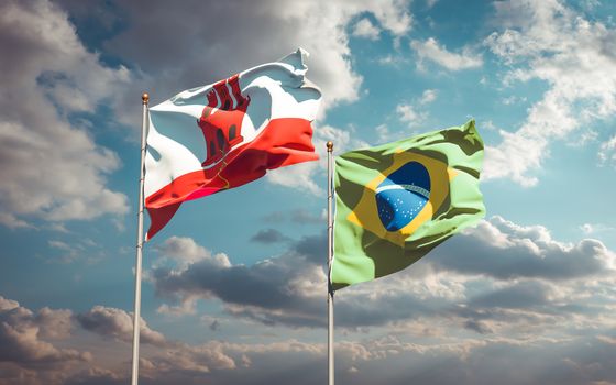 Beautiful national state flags of Gibraltar and Brasil together at the sky background. 3D artwork concept. 