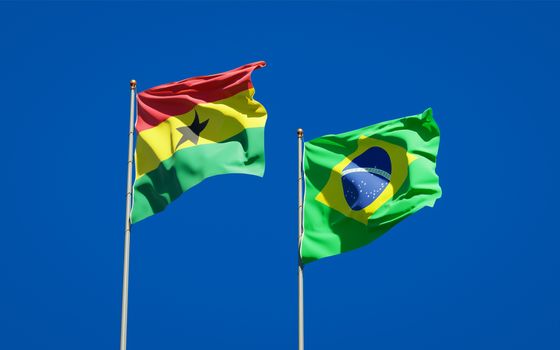 Beautiful national state flags of Ghana and Brasil together at the sky background. 3D artwork concept. 