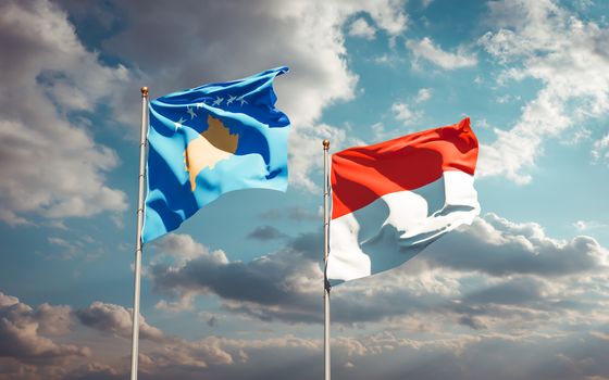 Beautiful national state flags of Kosovo and Indonesia together at the sky background. 3D artwork concept. 