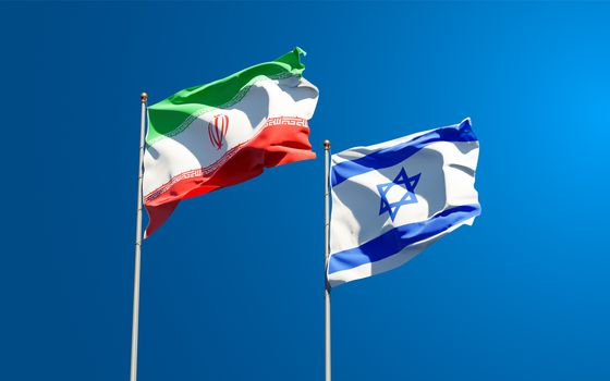 Beautiful national state flags of Iran and Israel together at the sky background. 3D artwork concept.