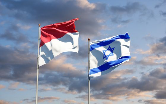 Beautiful national state flags of Monaco and Israel together at the sky background. 3D artwork concept.