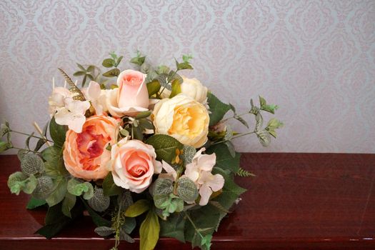 beautiful wedding bouquet on a wooden table