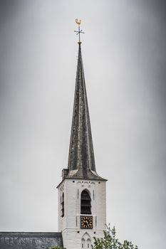 White church in Noordwijkerhout in the Netherlands with cloudy sky