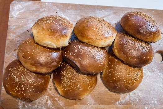 Homemade bread on table with light white flour.