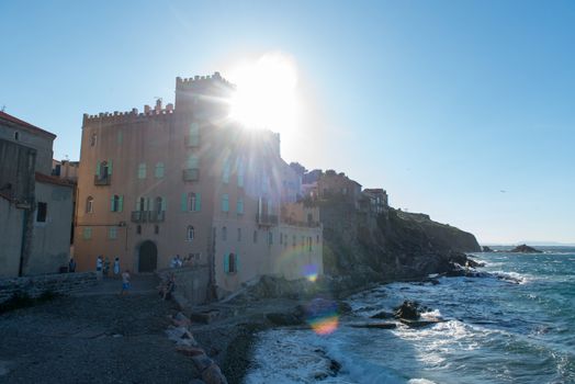 Coliure, France :  2020 june 22 :  People in Old town of Collioure, France, a popular resort town on Mediterranean sea.