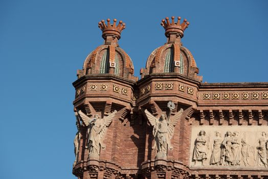 Barcelona, Spain :  June 26: People walk Arc de Triomf landmark in Ciutat Vella district on June 26, 2020 in Barcelona afer COVID 19.