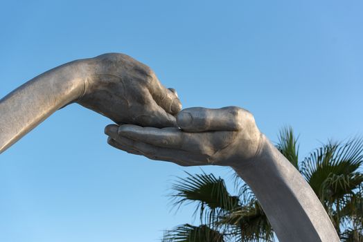 Castelldefels, Spain: 2020 June 25: Sculteure in the coastline of Castelldefels in Barcelona in summer after COVID 19 on June 2020.