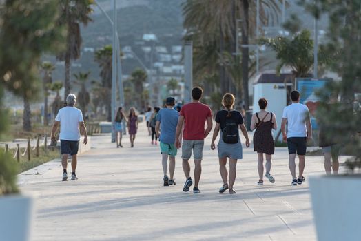 Castelldefels, Spain: 2020 June 25: People walk in the coastline of Castelldefels in Barcelona in summer after COVID 19 on June 2020.
