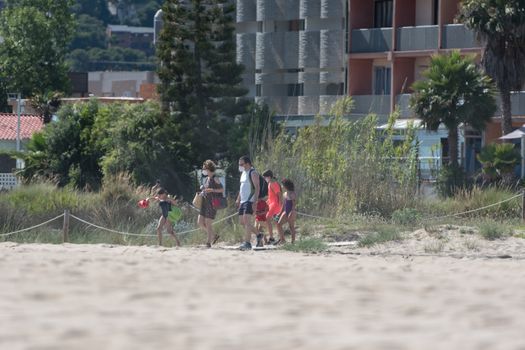 Castelldefels, Spain: 2020 June 25: People in the beach of Castelldefels in Barcelona in summer after COVID 19 on June 2020.