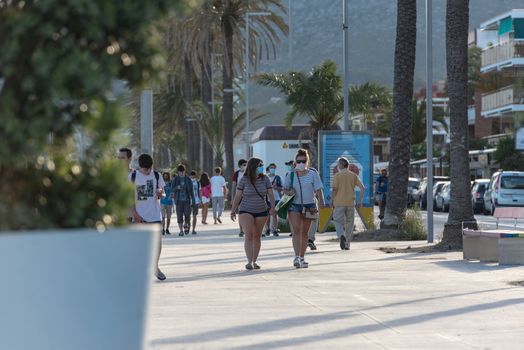 Castelldefels, Spain: 2020 June 25: People walk in the coastline of Castelldefels in Barcelona in summer after COVID 19 on June 2020.