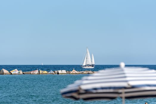 BARCELONA - JUNE 26, 2020: Barceloneta beach with people in summer after COVID 19 on June 26, 2020 in Barcelona, ​​Spain.