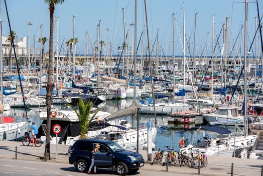 BARCELONA - JUNE 26, 2020: Port Olimpic in summer after COVID 19 on June 26, 2020 in Barcelona, ​​Spain.