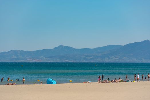 Canet en Roussillon, France: June 21, 2020: Sunny day in the tourist town of Canet en Roussillion in France on the Mediterranean Sea.