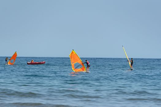Castelldefels, Spain: 2020 June 25: Windsurf on the coast of Castelldefels in Barcelona in summer after COVID 19 on June 2020.
