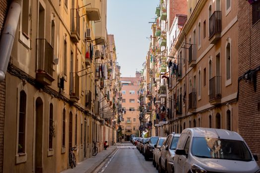 BARCELONA - JUNE 26, 2020: Street on Barceloneta beach with people from Barceloneta after COVID 19 on June 26, 2020 in Barcelona, ​​Spain.