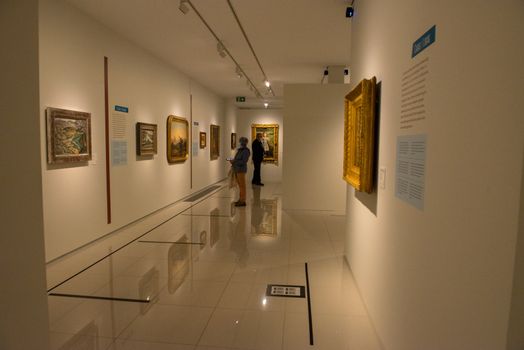 Escaldes - Engordany, Andorra - June 17 2020 : Visitors in the museum Carmen Thyssen. The museum remains to one of significant objects in Andorra on June 17 2020 in Andorra.