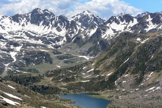 Beautiful view hiking in the Andorra Pyrenees Mountains in Ordino, near the Lakes of Tristaina.