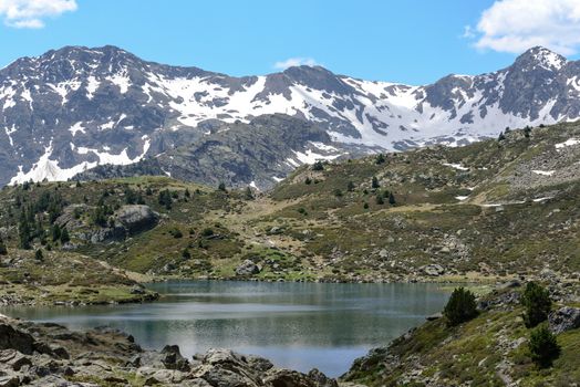 Beautiful view hiking in the Andorra Pyrenees Mountains in Ordino, near the Lakes of Tristaina.