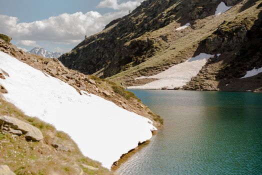 Beautiful Querol Lake in the mountain refuge in the Incles Valley, Canillo, Andorra.