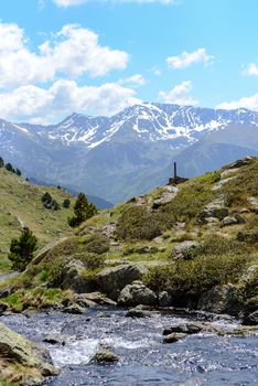 Beautiful view hiking in the Andorra Pyrenees Mountains in Ordino, near the Lakes of Tristaina.