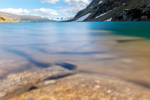 Beautiful Querol Lake in the mountain refuge in the Incles Valley, Canillo, Andorra.