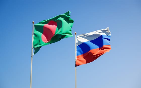 Beautiful national state flags of Russia and Bangladesh together at the sky background. 3D artwork concept. 