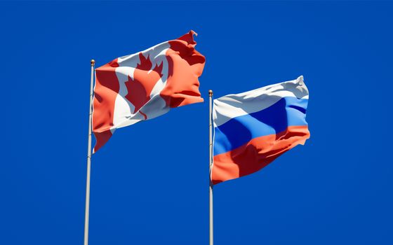 Beautiful national state flags of Russia and Canada together at the sky background. 3D artwork concept. 