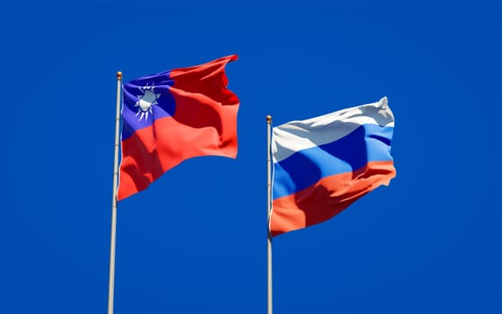 Beautiful national state flags of Russia and Taiwan together at the sky background. 3D artwork concept. 