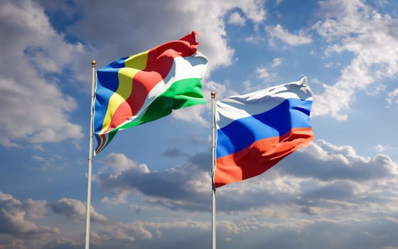 Beautiful national state flags of Seychelles and Russia together at the sky background. 3D artwork concept. 