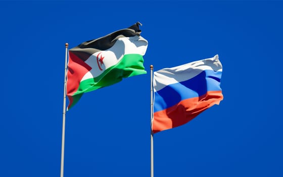 Beautiful national state flags of Sahrawi and Russia together at the sky background. 3D artwork concept. 