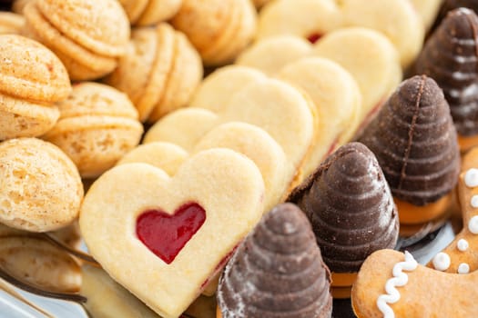 background of czech traditional homemade christmas cookies, shallow DOF, focus on heart