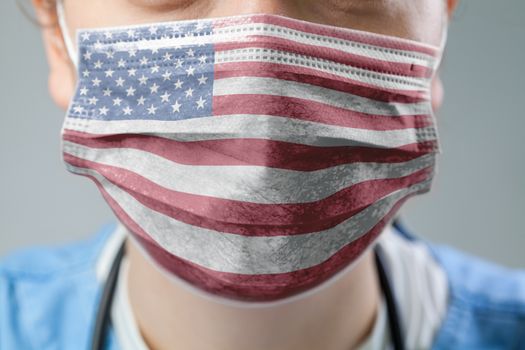 Doctor wearing protective medical textured mask,flag of The United States of America,COVID-19 Coronavirus pandemic crisis,global corona virus disease outbreak,US healthcare system illustration concept