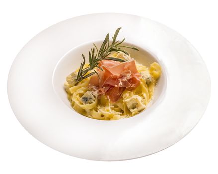 Tagliatelle Pasta with Hamon and Dor Blue Hamon, Dor Blue, Cream, Parmesan, Basil . Isolated image on white background.