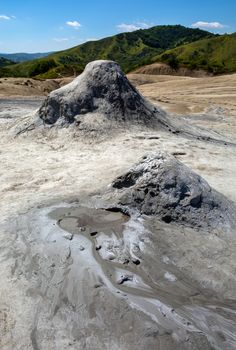 Mud geyser or mud volcano. Geological formation. particular hydrogeological conditions Generally all geyser field sites are located near active volcanic areas