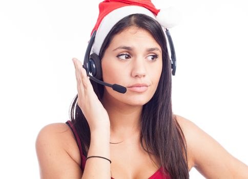 Christmas headset woman from telemarketing call center wearing red santa hat talking smiling isolated on white background.