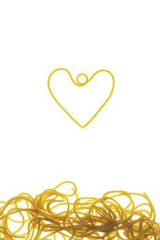 Swirls of cooked spaghetti. Spaghetti heart shape
