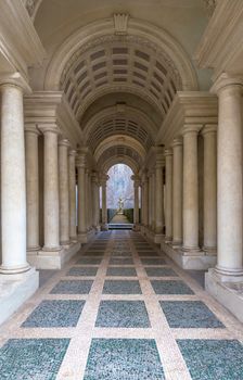 ROME, ITALY - August 23, 2018: Prospettiva Borromini (Borromini Perspective), corridor with marble columns in this luxury palace
