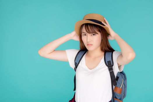 Beautiful young asian woman upset and worry travel summer trip in abroad isolated on blue background, tourist asia girl having problem and stress journey in vacation for leisure, holiday concept.