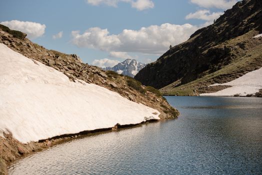 Beautiful Querol Lake in the mountain refuge in the Incles Valley, Canillo, Andorra.