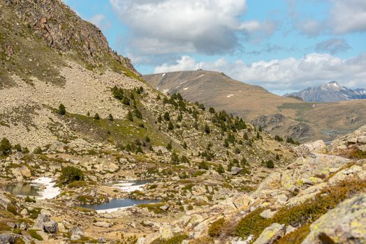 Lake in the circuit of Lake Pessons Grau Roig, Andorra.