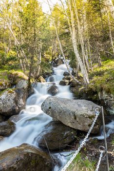 Waterfall in the Riu de la Bor in L Aldosa de Canillo in Andorra in spring