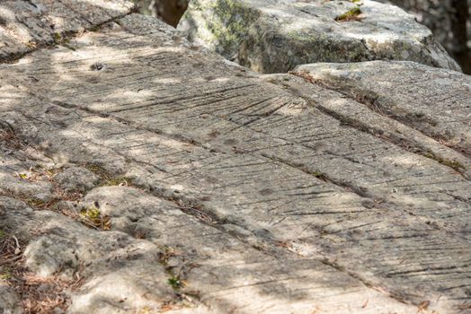 Canillo, Andorra : 2 MAY 2020 : Sunny day in the roc de les Bruixes is a set of prehistoric rock engravings from the Bronze Age in Prats, Canillo, Andorra.
